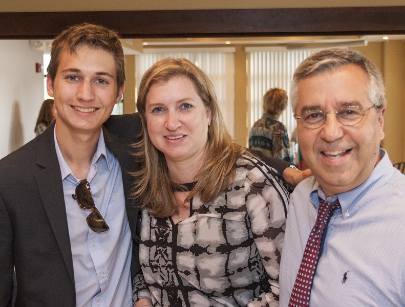 Saint Stephen's Epispocal School student Julian Freij (left), author of AS LONG AS THE MOON SHINES, Best Play at Theatre Odyssey's Student Ten-Minute Playwriting Festival, with his mother Joanna, accepts congratulations from playwright Bernie Yanelli (right) at The Starlite Room on March 2, 2015.