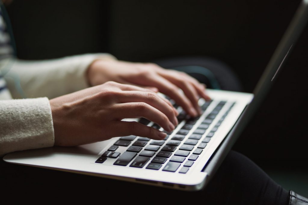 Photo courtesy Kaitlyn Baker / unsplash Typing on laptop keyboard